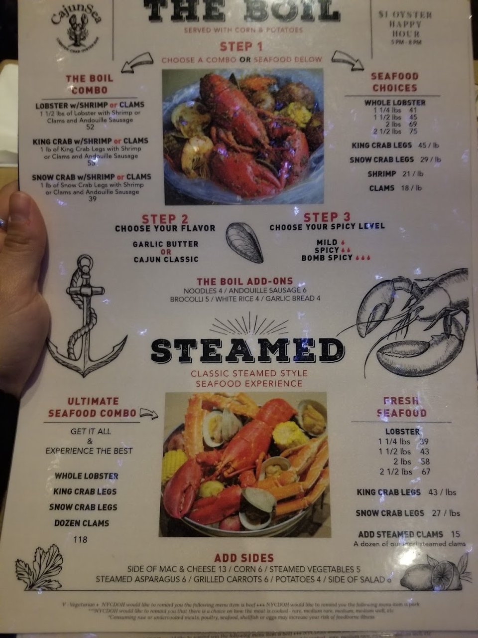 Printed menu beside a seafood dish