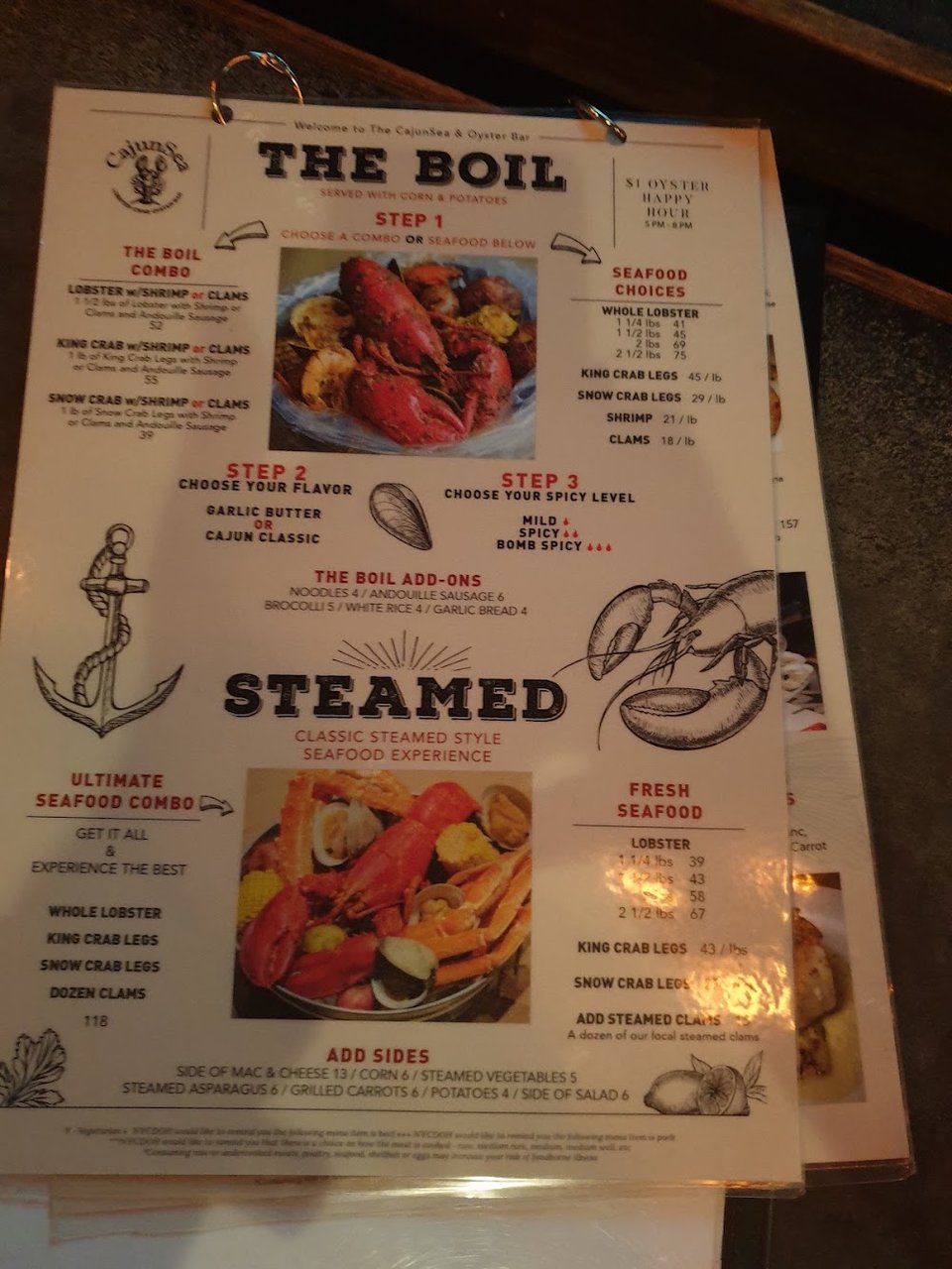 Menu layout for Cajun and seafood dishes